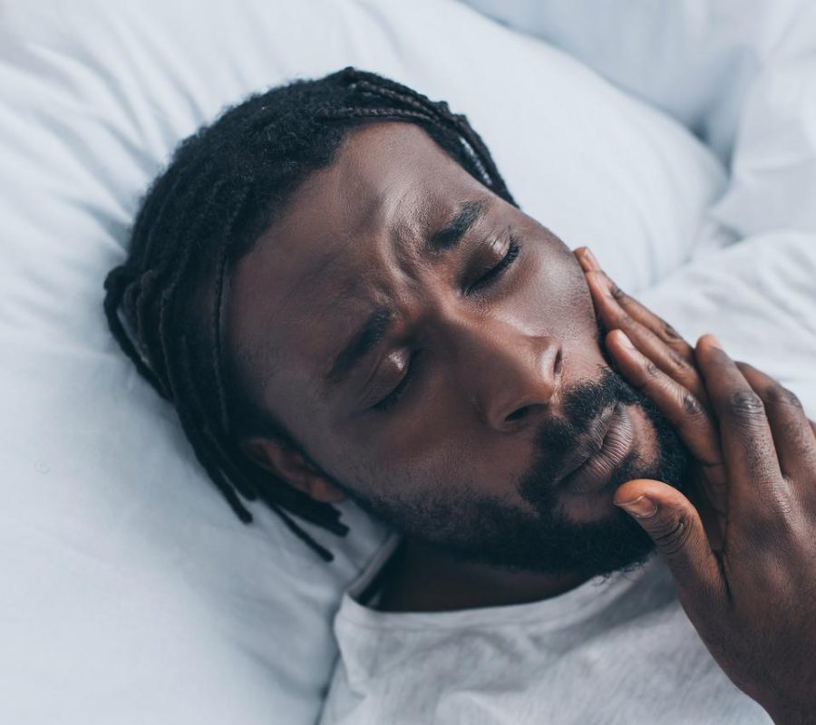 African man jaw pain
