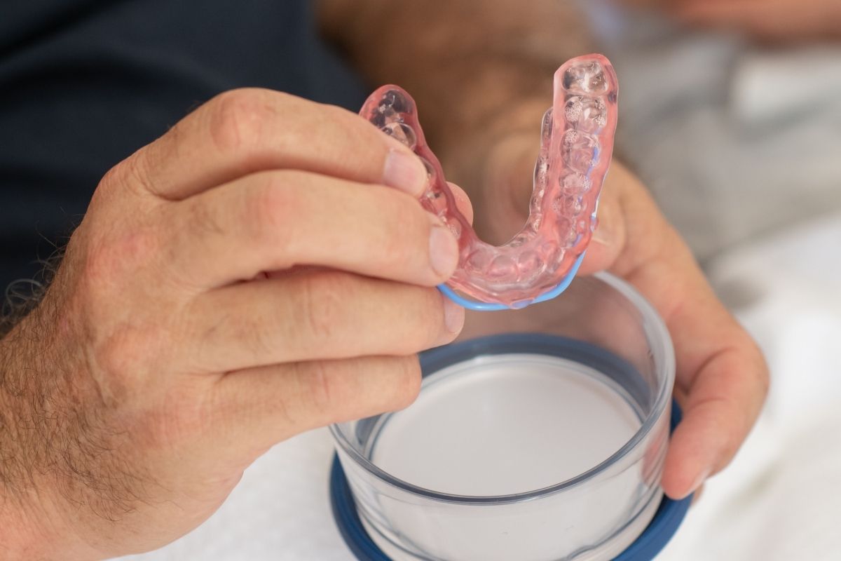 Patient holding SomnoDent Avant image