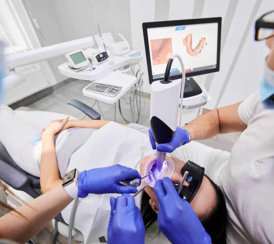 Dentist Preforming Intraoral Scan